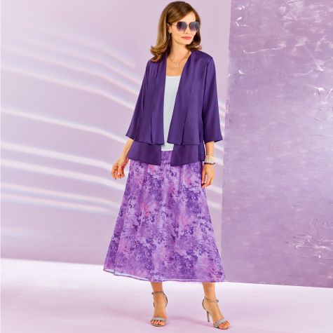 Craquez pour une silhouette tout en fluidité qui comporte une veste boléro, un top uni, et une jupe longue en voile Sergio di Fiori !