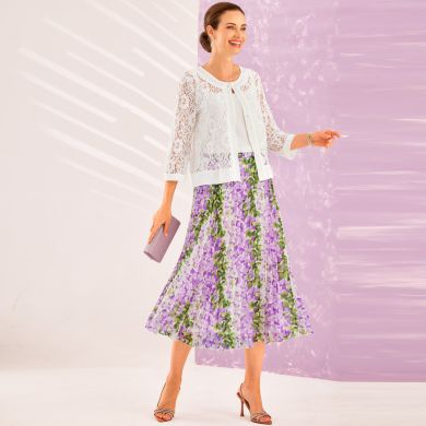 Besoin d’un look chic et lumineux ? Optez pour la veste boléro bord à bord et la jupe plissé soleil Sergio di Fiori !