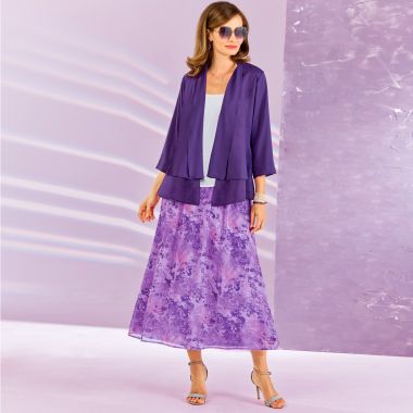 Craquez pour une silhouette tout en fluidité qui comporte une veste boléro, un top uni, et une jupe longue en voile Sergio di Fiori !
