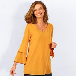 Blouse à noeud et volants